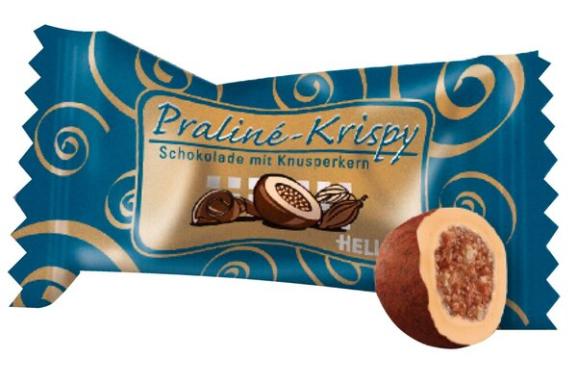 Praline Krispy, Cerialien in weißer Schokolade mit Pistaziengeschmack